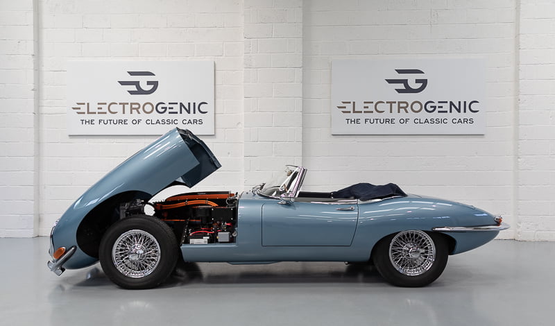 electric E-Type with bonnet up showing the electric conversion kit