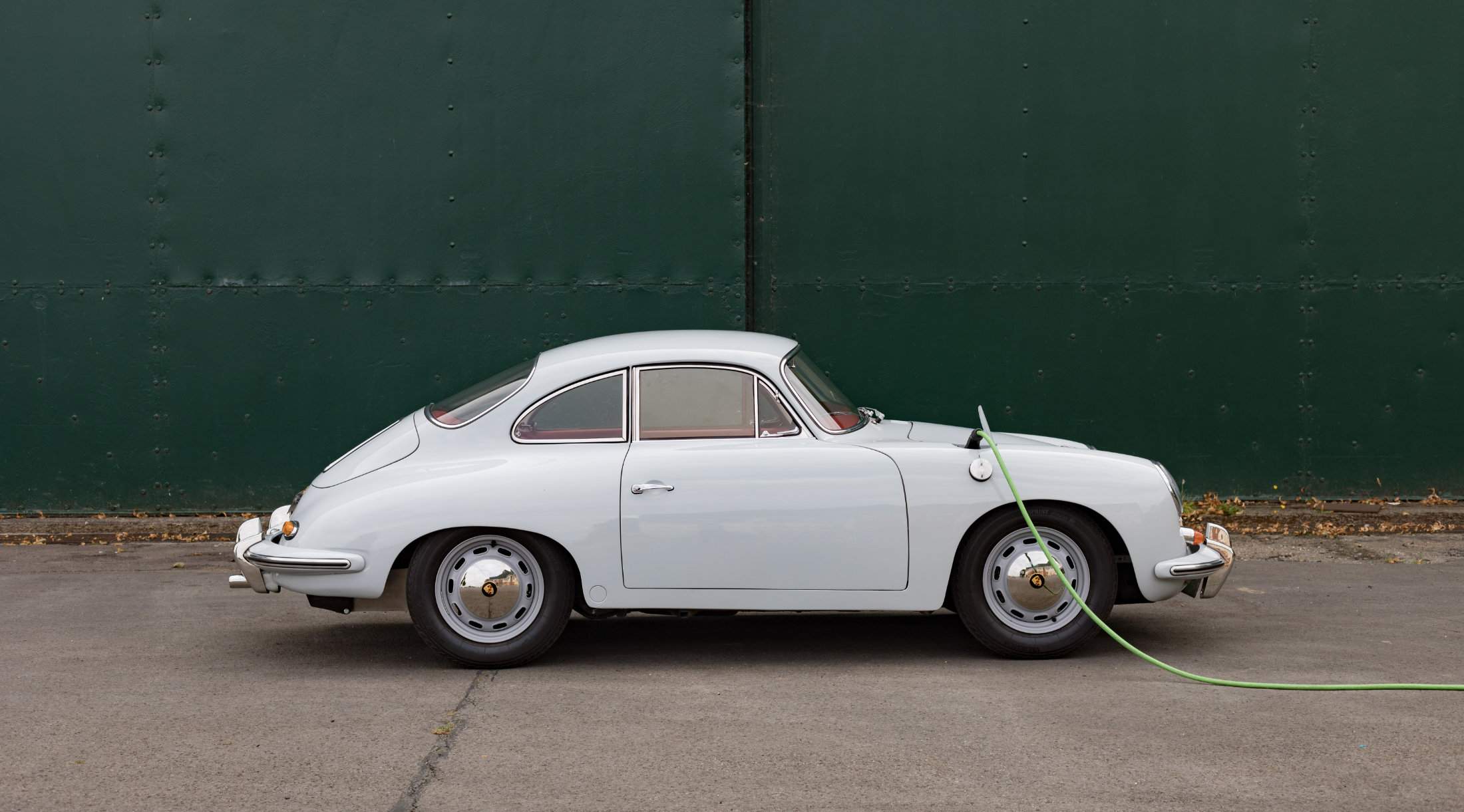 Converted classic electric Porsche 356 charging