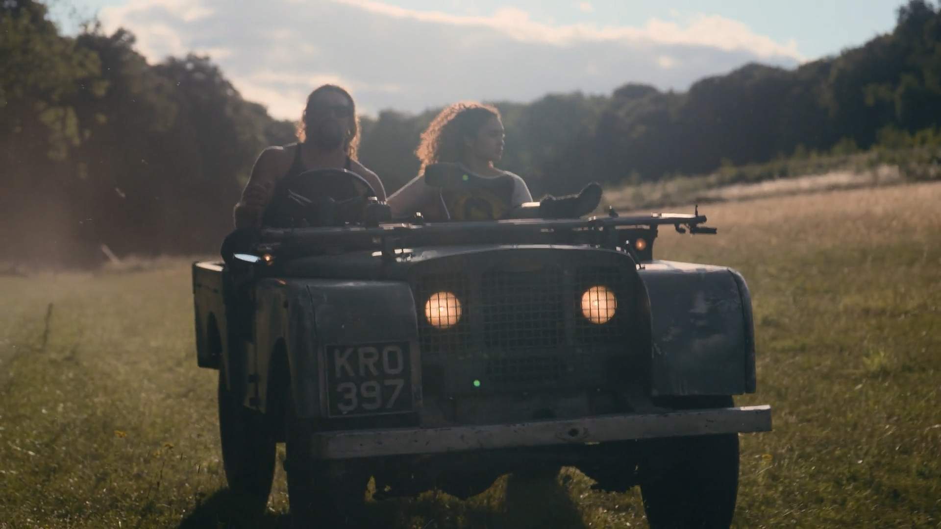 Close up of Jason-Mamoa driving Electrogenic series Land Rover convertion